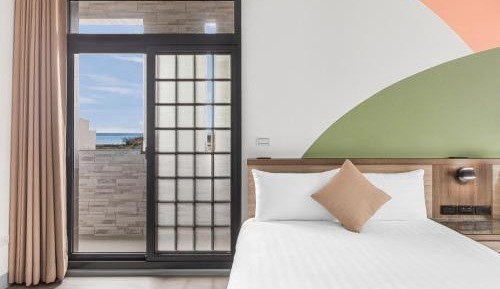 Deluxe Quadruple Room with Balcony