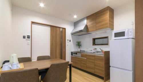 Standard Room (1 Double Bed and 2 Single Beds) with Kitchen and Washing Machine - Non-Smoking