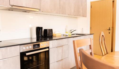 Three-Bedroom Apartment with Balcony