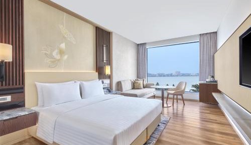 Executive King Room with Pool View and complimentary mini-bar once during the stay and office transfers upto 3.1 mi