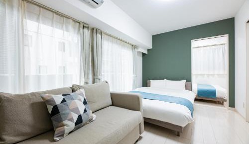 Deluxe Room (2 Double Beds and 1 Sofa Bed) - Non-Smoking - Cleaning Fee Extra