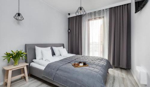 One-Bedroom Apartment with Balcony and Water View