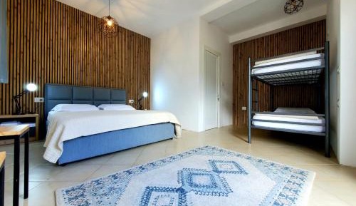 Quadruple Room with Private Bathroom