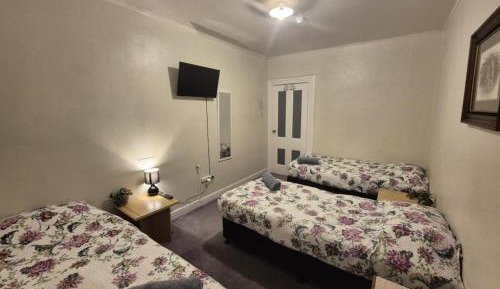 Triple Room with Shared Bathroom
