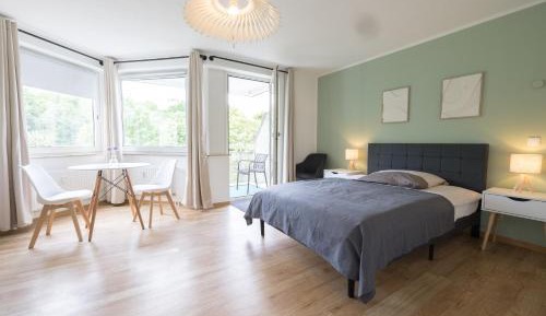 One-Bedroom Apartment with Balcony and Mountain View  