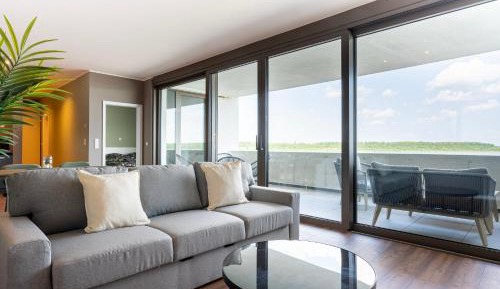 One-Bedroom Apartment with Balcony and Water View