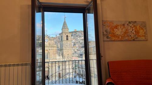 One-Bedroom Apartment with Balcony and City View