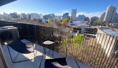 One-Bedroom Apartment with Balcony and City View