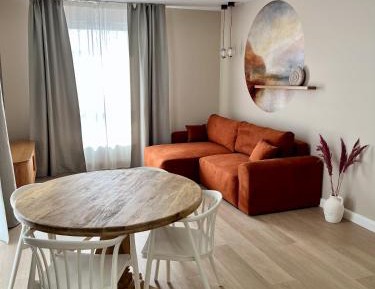 One-Bedroom Apartment with Balcony and City View