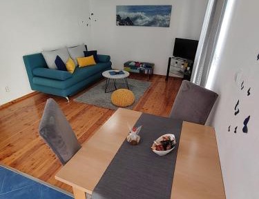 One-Bedroom Apartment with Balcony and Sea View