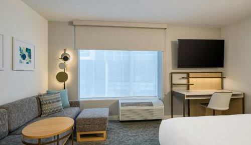 One-Bedroom Queen Suite with Sofa Bed and City View