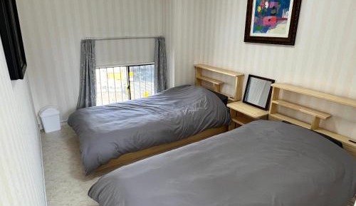 Twin Room with Shared Bathroom