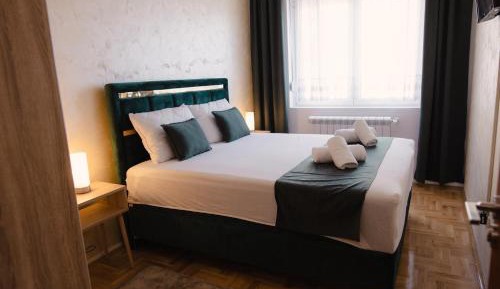 Two-Bedroom Apartment with Balcony