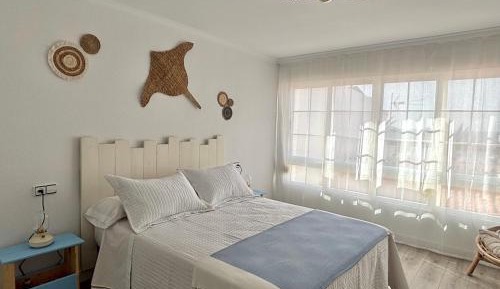 Three-Bedroom Apartment with Harbor View