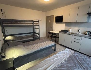 Quadruple Room with Shared Bathroom