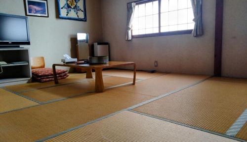 Economy Quadruple Room with Shared Bathroom