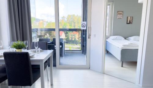 One-Bedroom Apartment with Balcony and City View