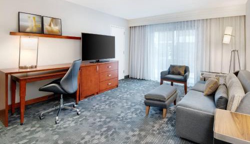 One-Bedroom King Suite with Sofa Bed and Courtyard View