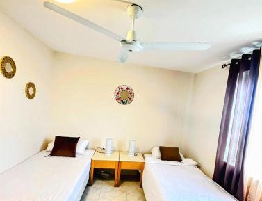 Twin Room with Private Bathroom