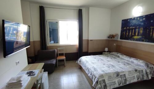 Quadruple Room with Private Bathroom