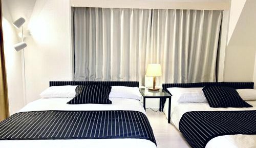 One-Bedroom Apartment with Balcony and City View