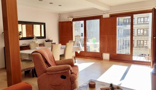 Four-Bedroom Apartment with Balcony 