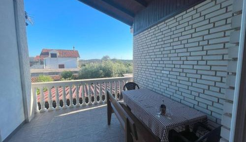 Two-Bedroom Apartment with Balcony