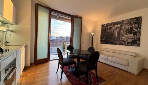 One-Bedroom Apartment with Balcony and City View