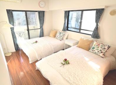 One-Bedroom Apartment with Balcony and City View