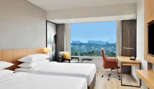 Deluxe Guest room with 2 Twin/Single Bed(s), City view