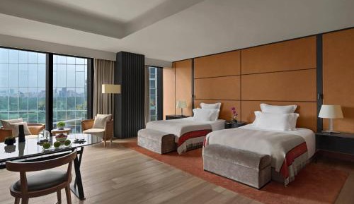 Deluxe Room with Two Double Beds and City View (Free Mini-bar soft drinks & beers + 1.9 mi pick-up or drop-off service + 4.6 feet wide double beds)