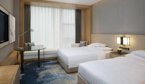 Guest Room with 2 Double Beds and Sofa Bed
