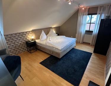Queen Room with Shared Bathroom