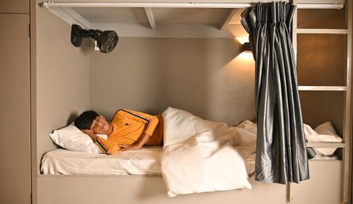 Single Bed in Dormitory Room