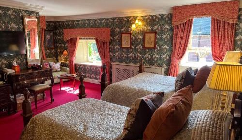 Premier Family Room in Adjacent Coach House