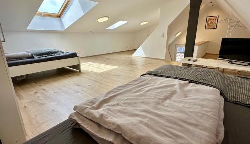 Four-Bedroom Apartment with Balcony 