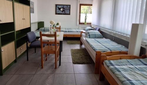 Quadruple Room with Shared Bathroom