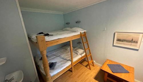 Economy Quadruple Room with Shared Bathroom