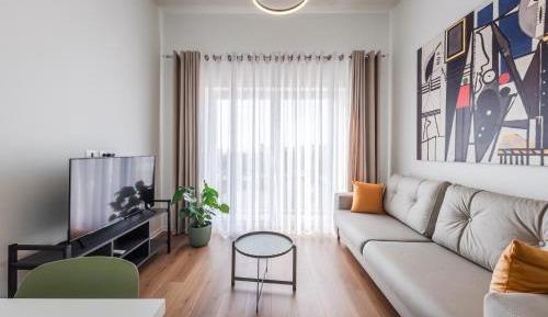One-Bedroom Apartment with Balcony and Sea View