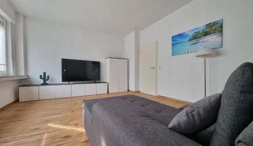 Four-Bedroom Apartment with Balcony 