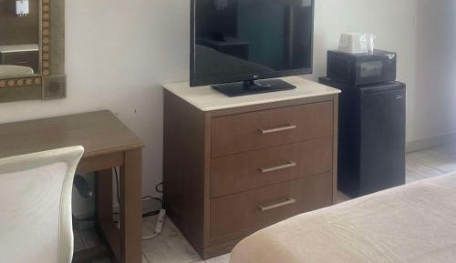 Quadruple Room with Two Queen Beds and Pool View - Non Smoking