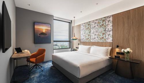 Two-Bedroom Suite with Sea and City View