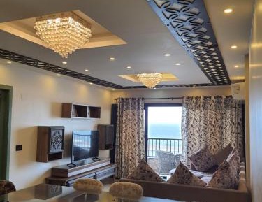 Three-Bedroom Premium Apartment with Balcony