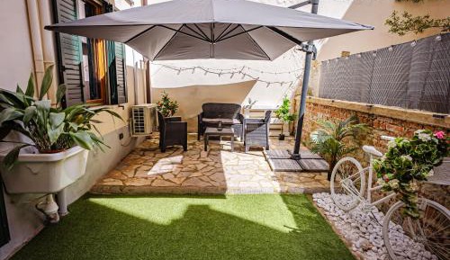 One-Bedroom Apartment with Garden