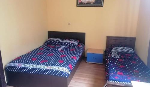 Quadruple Room with Shared Bathroom