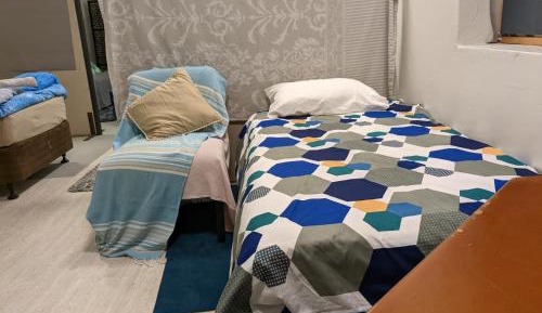 Single Bed in Dormitory Room