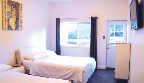 Deluxe Suite with Two Queen Beds