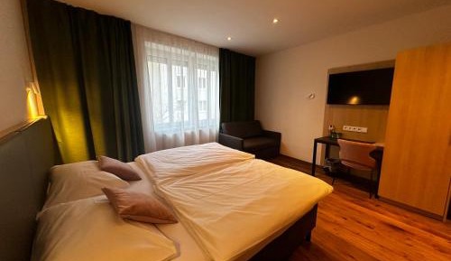 Double Room with Sofa Bed (3 Adults + 1 Child)