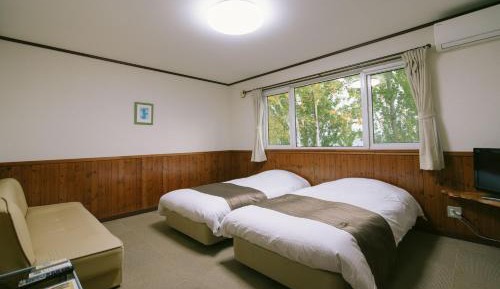 Twin Room with Shared Bathroom and Toilet- Non-Smoking