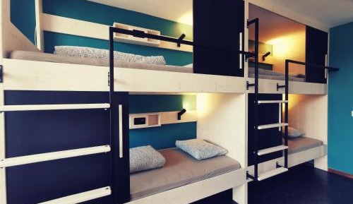 Single Bed in 4-Bed Female Dormitory Room with Shared Bathroom